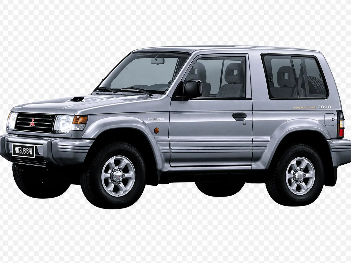 Second-generation Mitsubishi Pajero, a silver short-wheelbase three-door with Intercooler Turbo 2800 side graphics, studio side profile