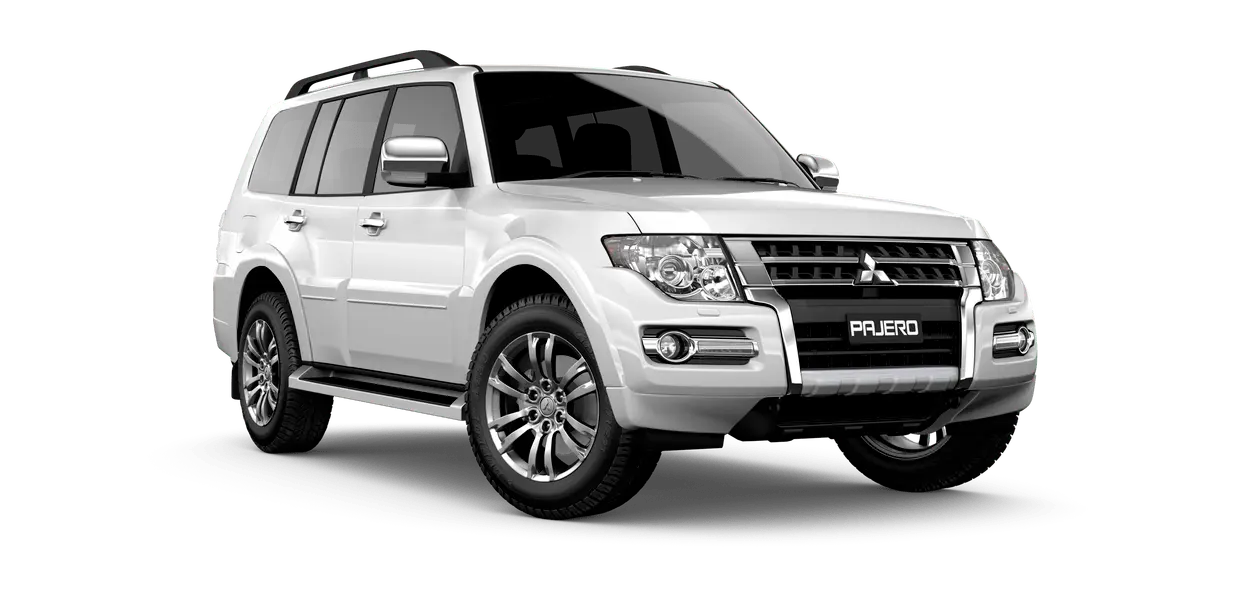 Mitsubishi Pajero Gen 4 in Warm White Mica, front three-quarter studio view