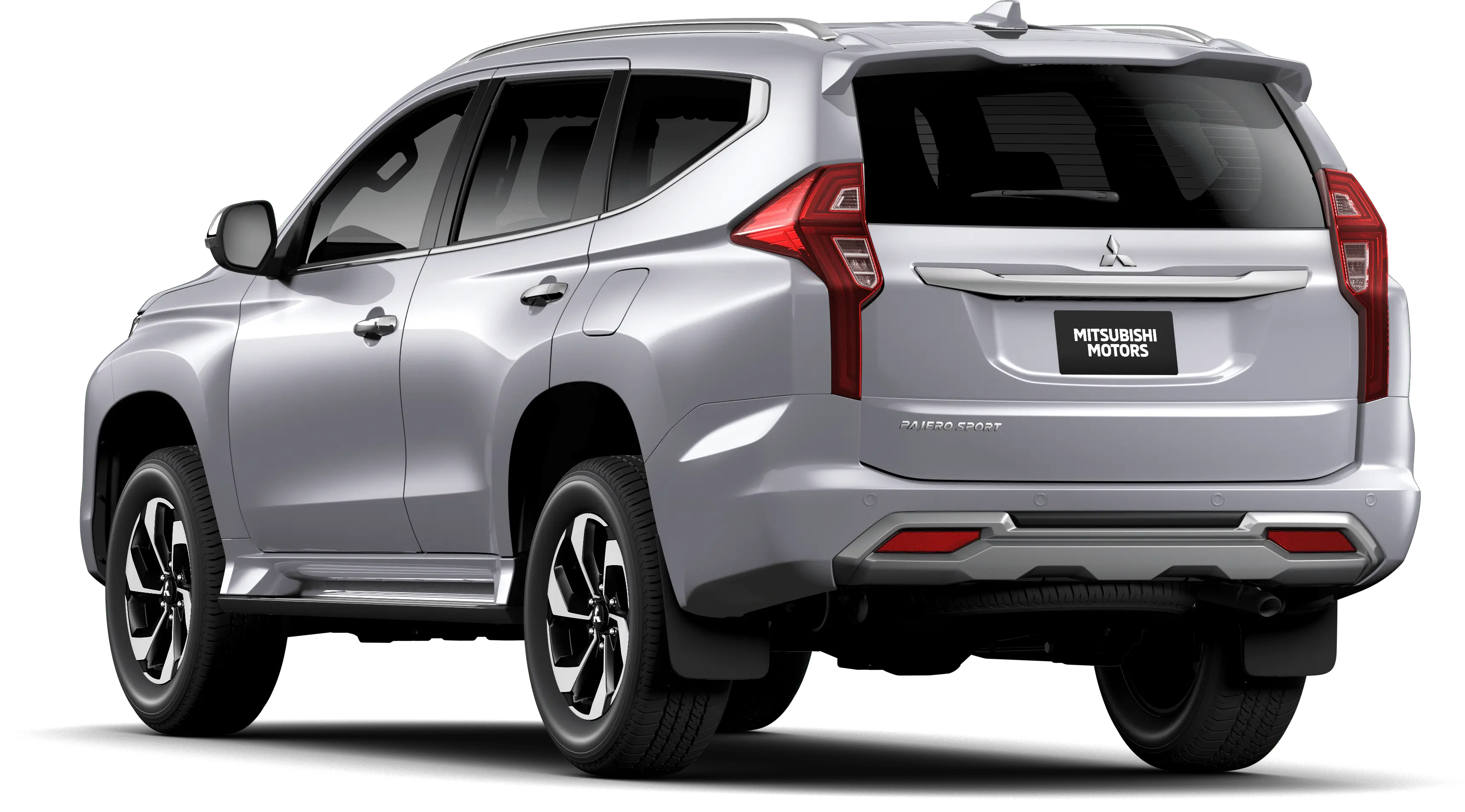 Mitsubishi Pajero Sport in grey, rear three-quarter studio view