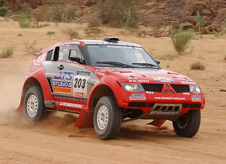 2004 Mitsubishi Pajero Evolution factory Dakar rally car in Repsol livery
