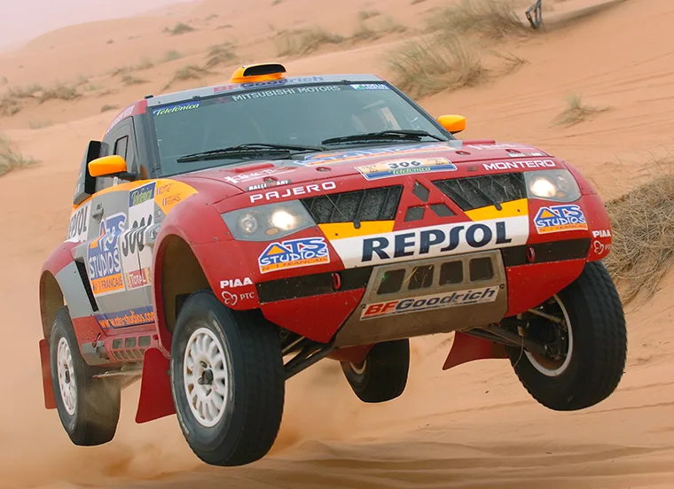 2005 Mitsubishi Pajero Evolution Dakar rally car in Repsol livery