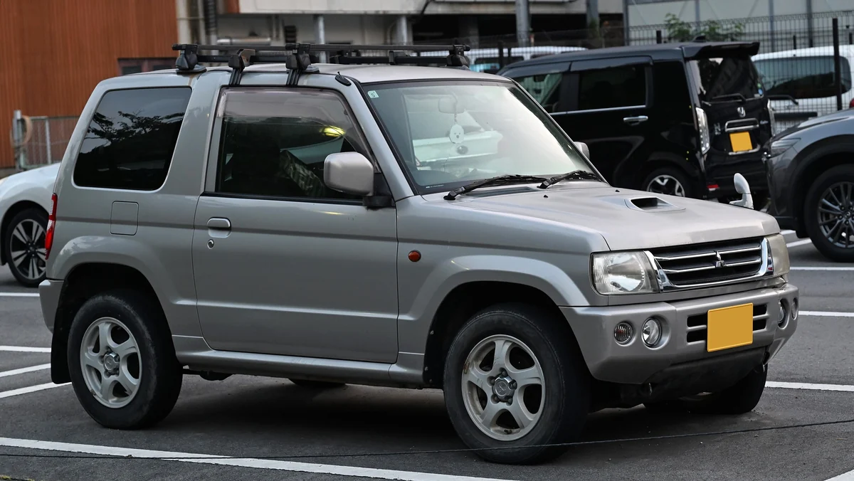 Silver second-generation Mitsubishi Pajero Mini with roof rails